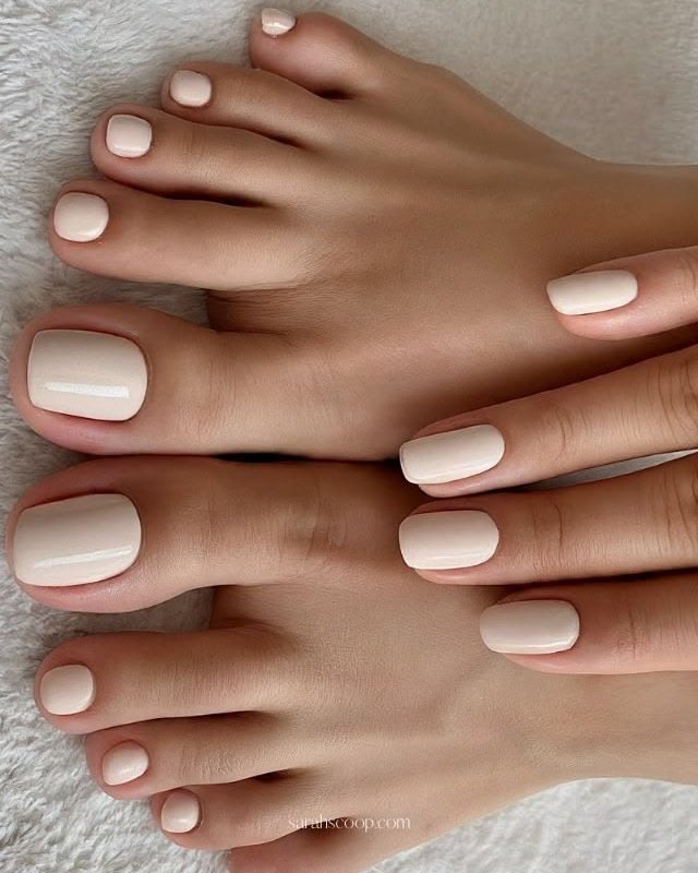 Matching soft white manicure and pedicure
